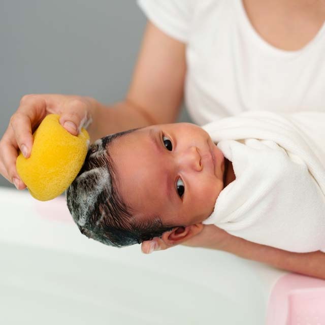 Essential Newborn Grooming Tips: Caring for Baby's Delicate Hair, Nails, and Skin